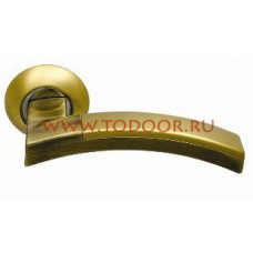 Дверная ручка на круглом основании SILLUR 132 S.GOLD/BR золото матовое/антич. бронза